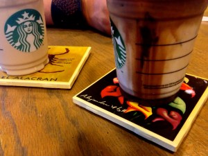 Iced Starbucks with coasters made by local artist and sold at the Texas Folklife Festival, 2015.